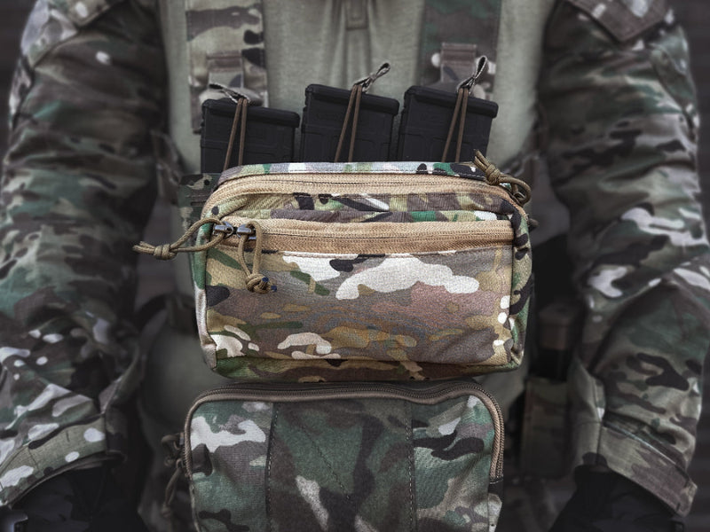 Multicam Admin Pouch Mounted to Chest rig worn by model front view
