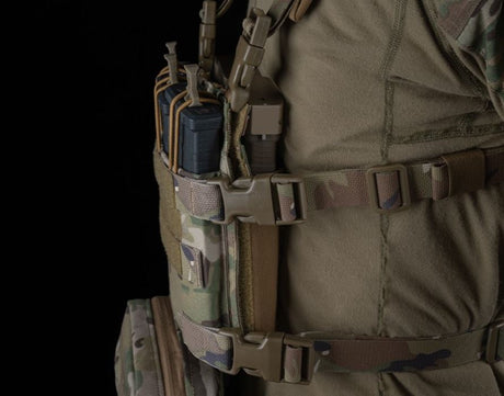  erebus industries Tracker Chest Rig in multicam pattern, close up side view, 556 rifle magazines inserted into 556 mag pouch, highlighting 556 magazine pouch mounted behind placard via velcro