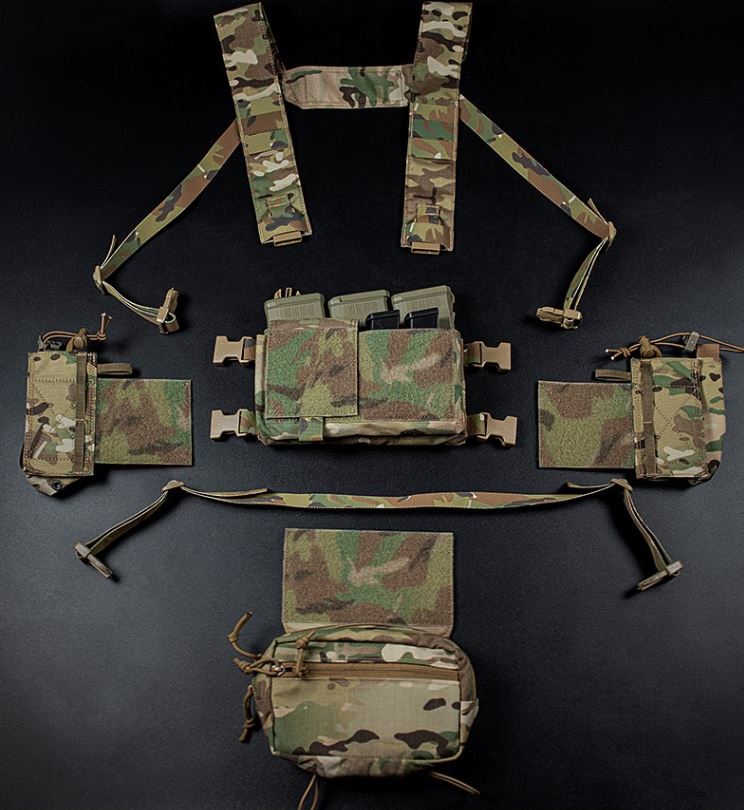 erebus industries MKIV Chest Rig in multicam pattern, front view, dissasembed highlighting key compenets, main 556 magazine pouch and placard, included admin pouch, included h harness with molle webbing, and included wing pouches for radios. 