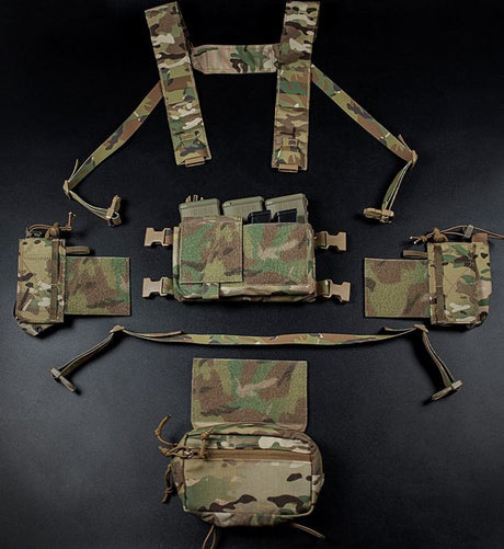 erebus industries MKIV Chest Rig in multicam pattern, front view, dissasembed highlighting key compenets, main 556 magazine pouch and placard, included admin pouch, included h harness with molle webbing, and included wing pouches for radios. 