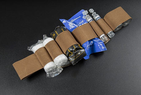 Erebus industries Ifak insert type a, Front view, with medical supplies inserted, for medical pouches. in multicam pattern.