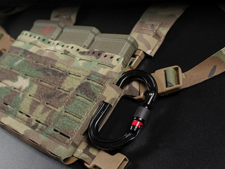 erebus industries slick rig chest rig in multicam patter, close up-side view highlighting molle sections on the side of chest rig, 556 Magazines inserted. 